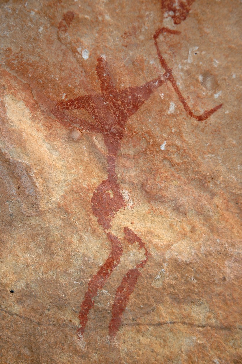 Bergkunst, forhistorie: Maleri av en karakter (bueskytter) i et utsmykket ly, i Uweinat-massivet, Sudan (Karkur-Talh eller Karkur Talh). Periode fra 8000 til 3000 år f.Kr. Fotografering av Unbekannt