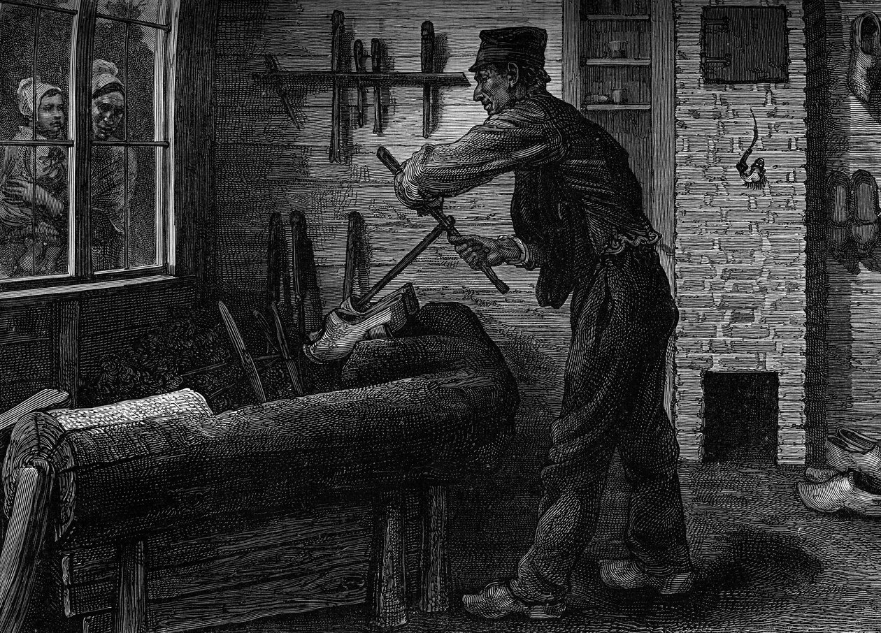 A sabotier at work in his workshop in Belgium, Engraving in the journal “” la jeunesse”” av Unknown artist