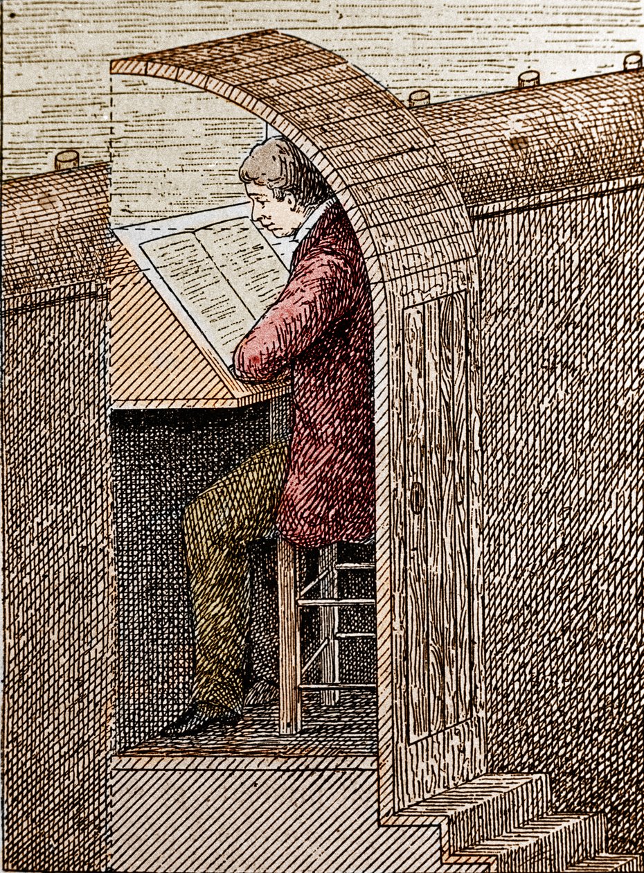 Blåseren i hullet hans. En teaterblåser hjelper komikere å huske teksten sin når de står på scenen. Her er han avbildet i sitt "hull" en åpning som praktiseres på forsiden av scenen vekk fra publikums øyne. Gravering av 1800-tallet. av Unknown artist