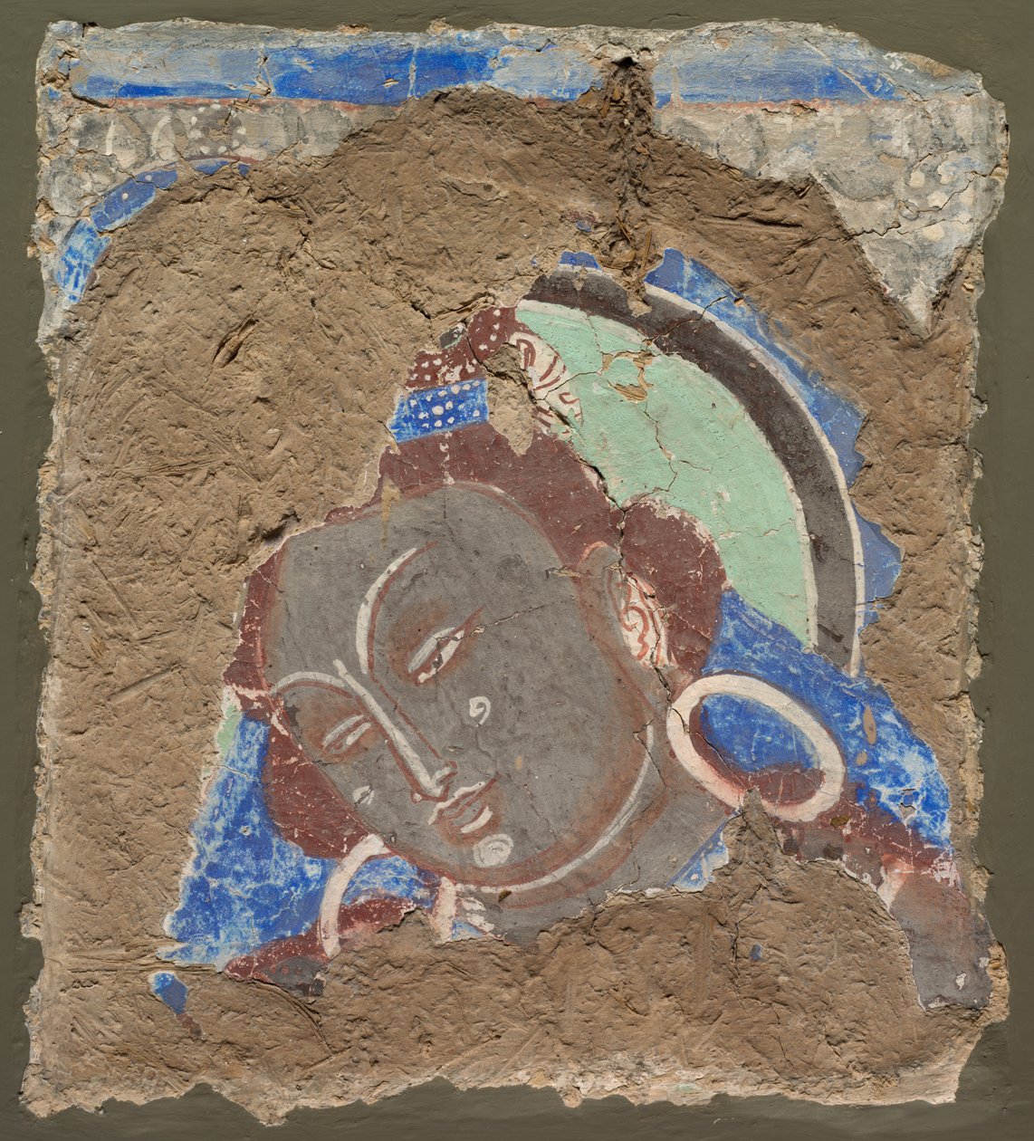 Fragment med et hode av Bodhisattva av Unknown artist