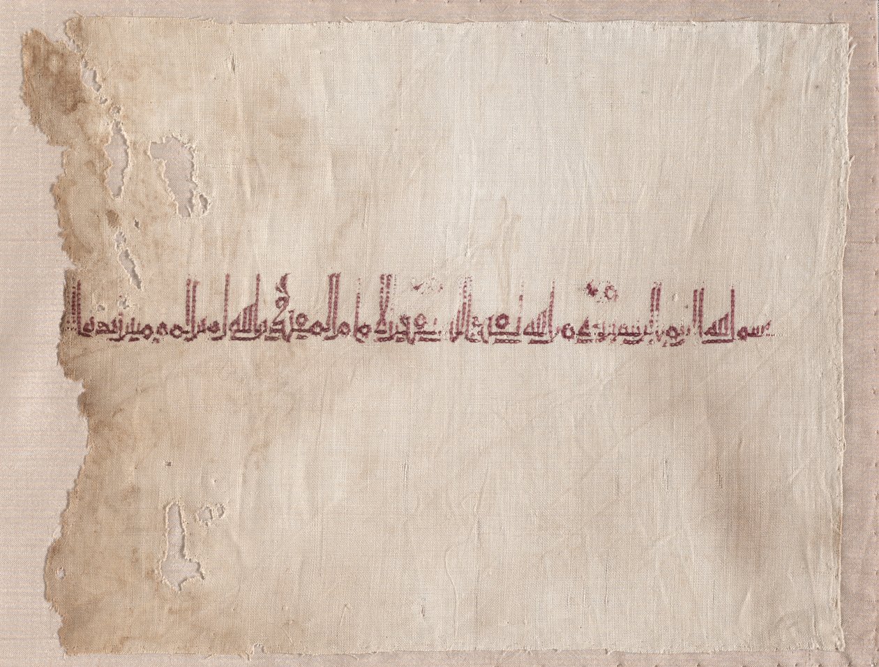 Fragmentær brodert tiraz av Unknown artist