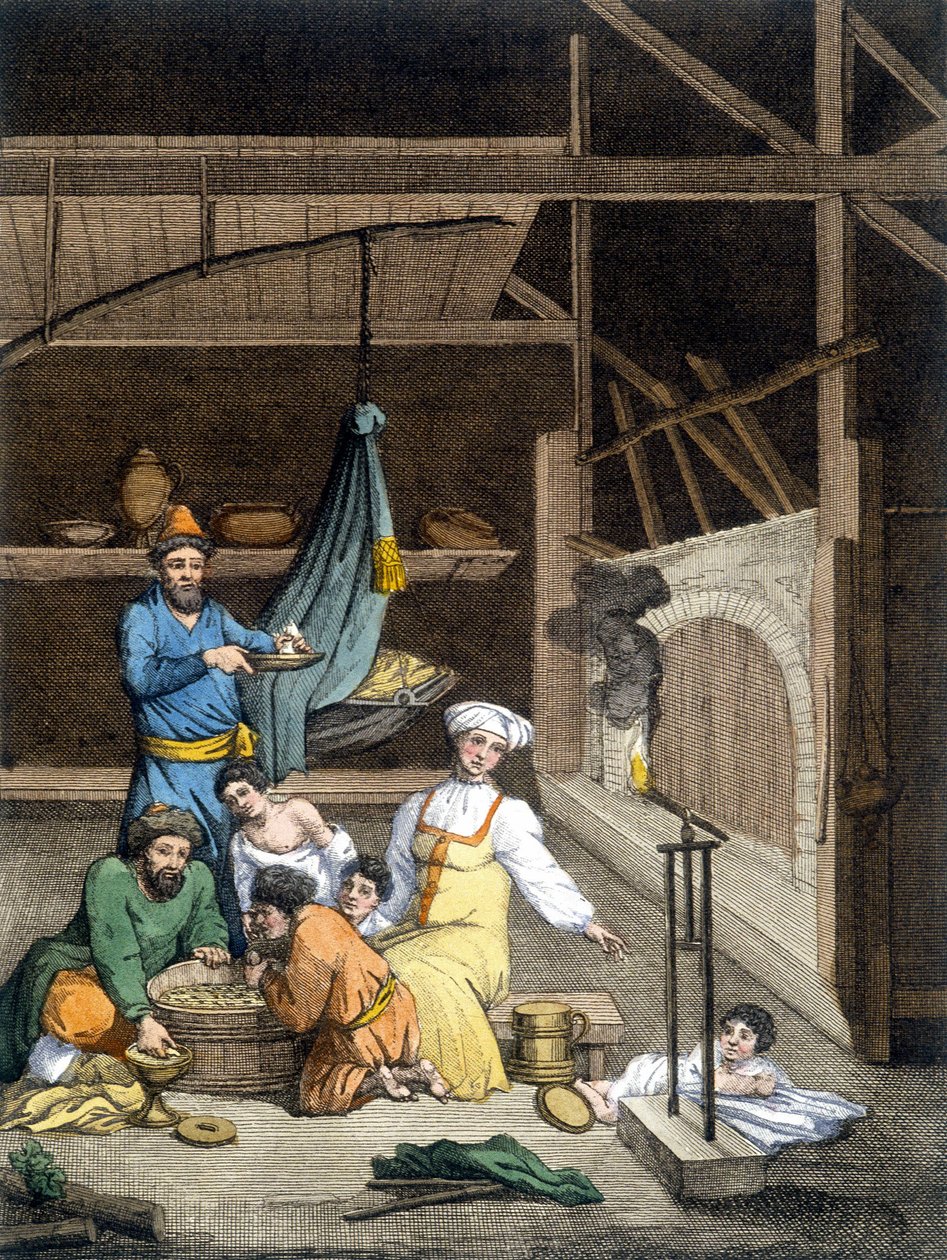 Inne i et russisk hus, en familie ved lunsjtid. av Unknown artist