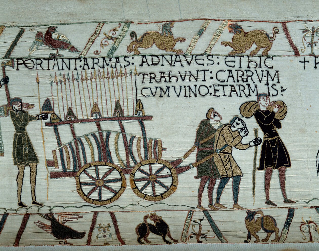 Våpen og vin blir brakt til skipene under tankingen for erobringen av England av flåtene til Vilhelm Erobreren (1027-1087) i 1066. Detalj av billedteppet til Bayeux eller Broderi av Dronning Mathilde av Unknown artist