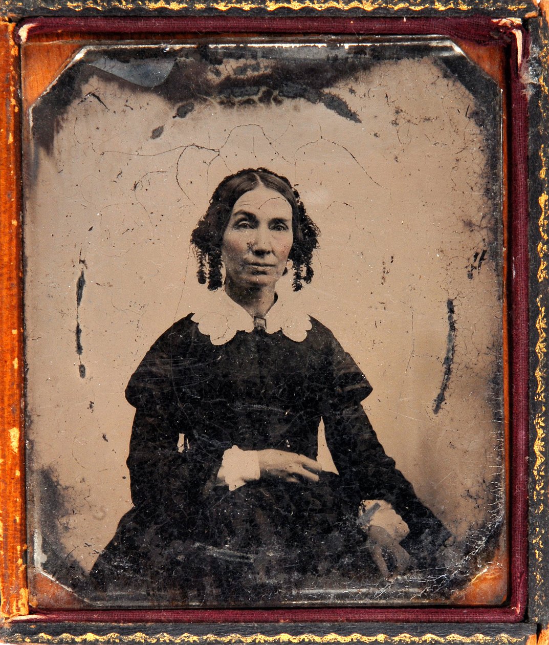 Portrett av en kvinne. Daguerreotypi (Daguerre) under ramme rundt 1850. av Unknown photographer
