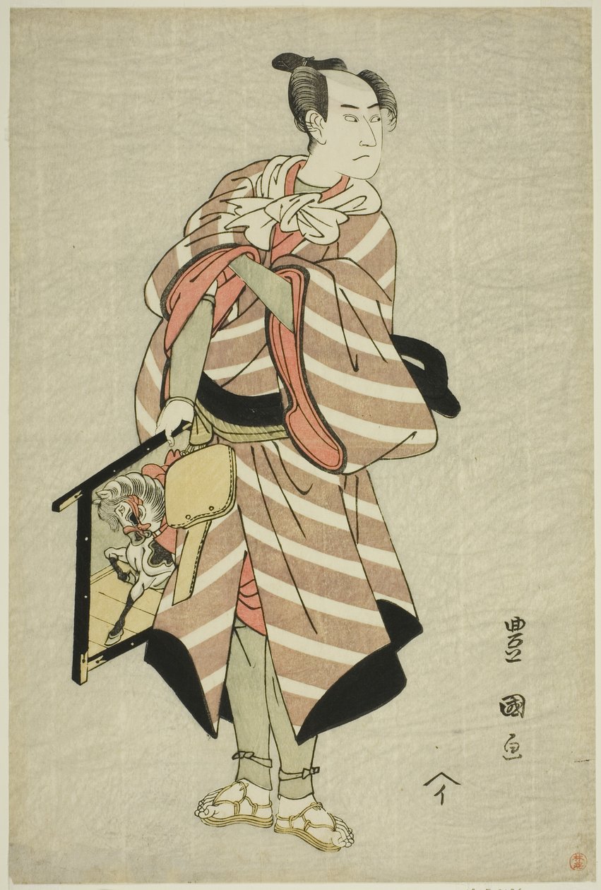 Skuespilleren Sawamura Sojuro III som pakkehestmannen Muchizo i stykket "Miyamairi Musubi no Kamigaki," fremførte på Kiri Theatre i den ellevte måneden, 1797 av Utagawa Toyokuni I