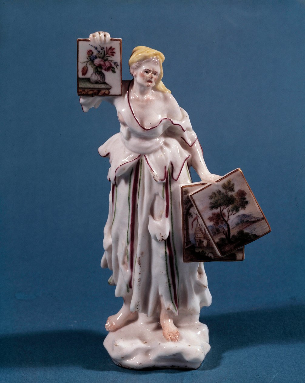 Porselensstatuett som representerer en ung kvinne som selger eller viser utskrifter. Venetiansk skole fra 1700-tallet. Paris, dekorativ kunst av Venetian School