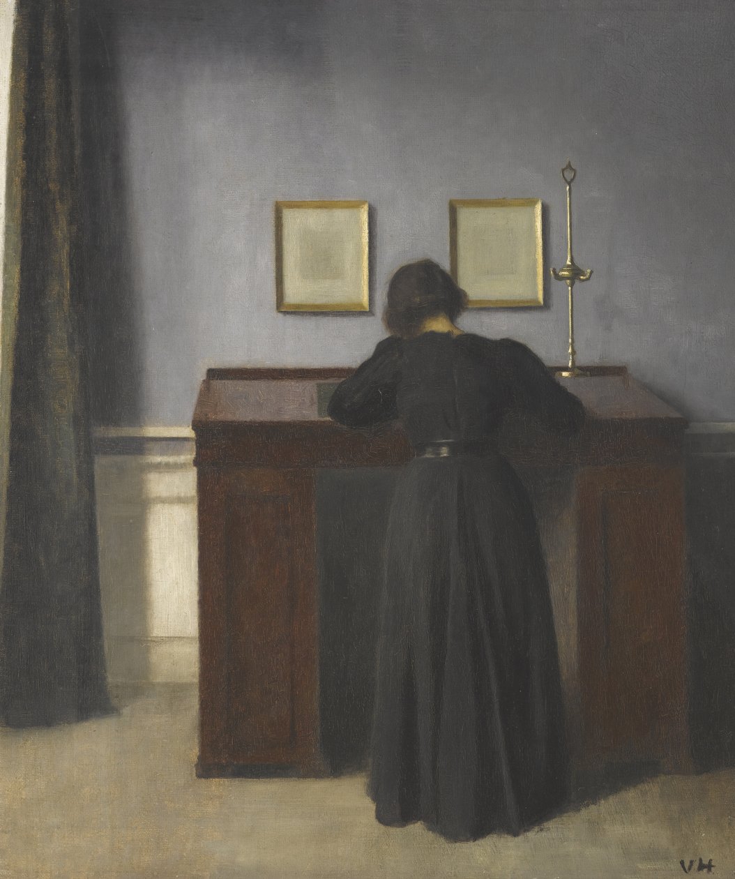 Ida står ved et skrivebord av Vilhelm Hammershøi