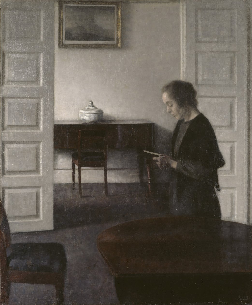 Interiør med en dame som leser, ca. 1900 (olje på lerret) av Vilhelm Hammershoi