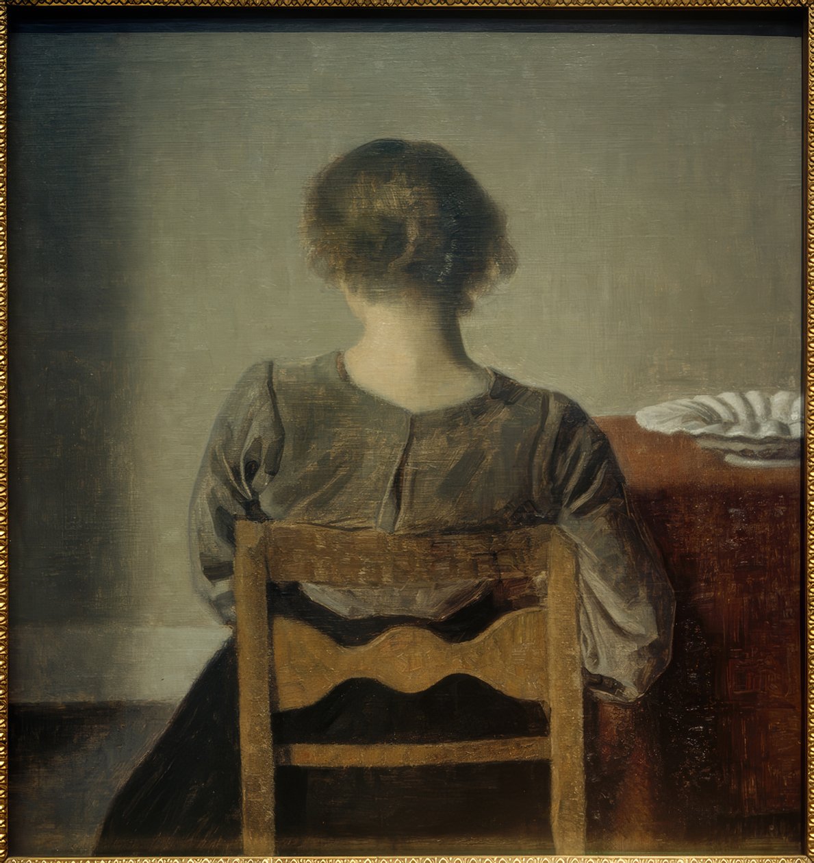 Ung kvinne. Hvile av Vilhelm Hammershoi