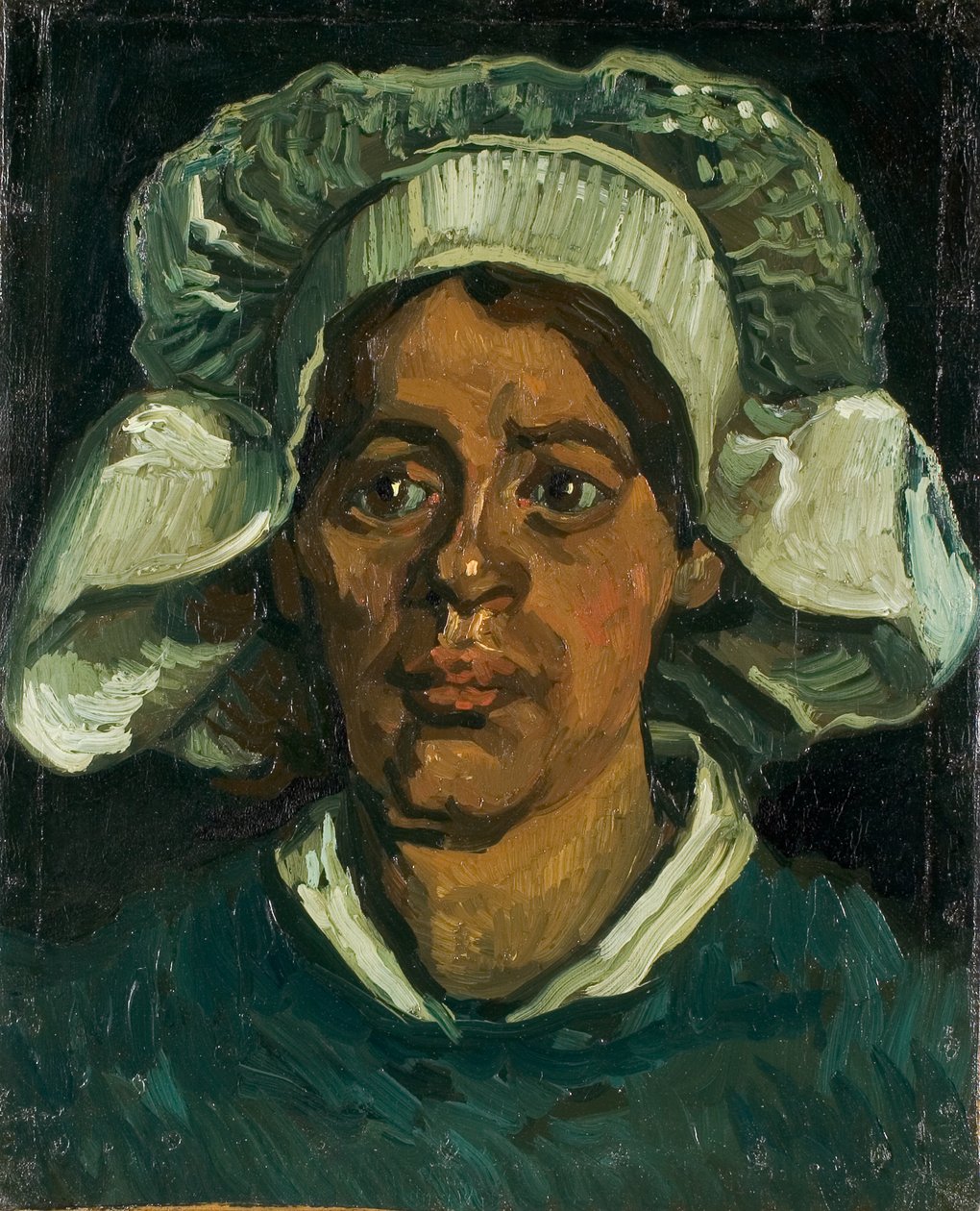 Hodet til en bondekvinne med hvit hette, 1884-1885. av Vincent van Gogh