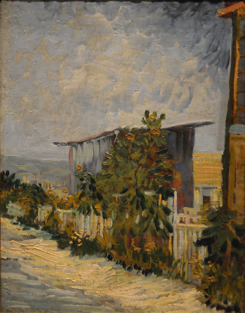 Skur ved Montmartre med solsikke, 1887 av Vincent van Gogh