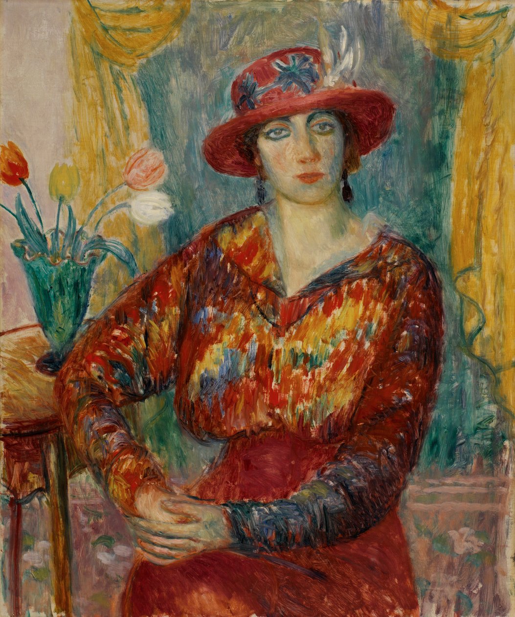 Kvinne i rød bluse med tulipaner av William James Glackens
