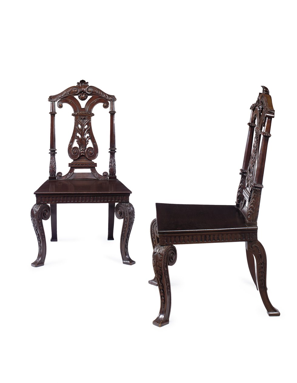 Par George II hall-stoler, utført av James Moore den yngre, ca. 1727-31 (mahogni) av William Kent