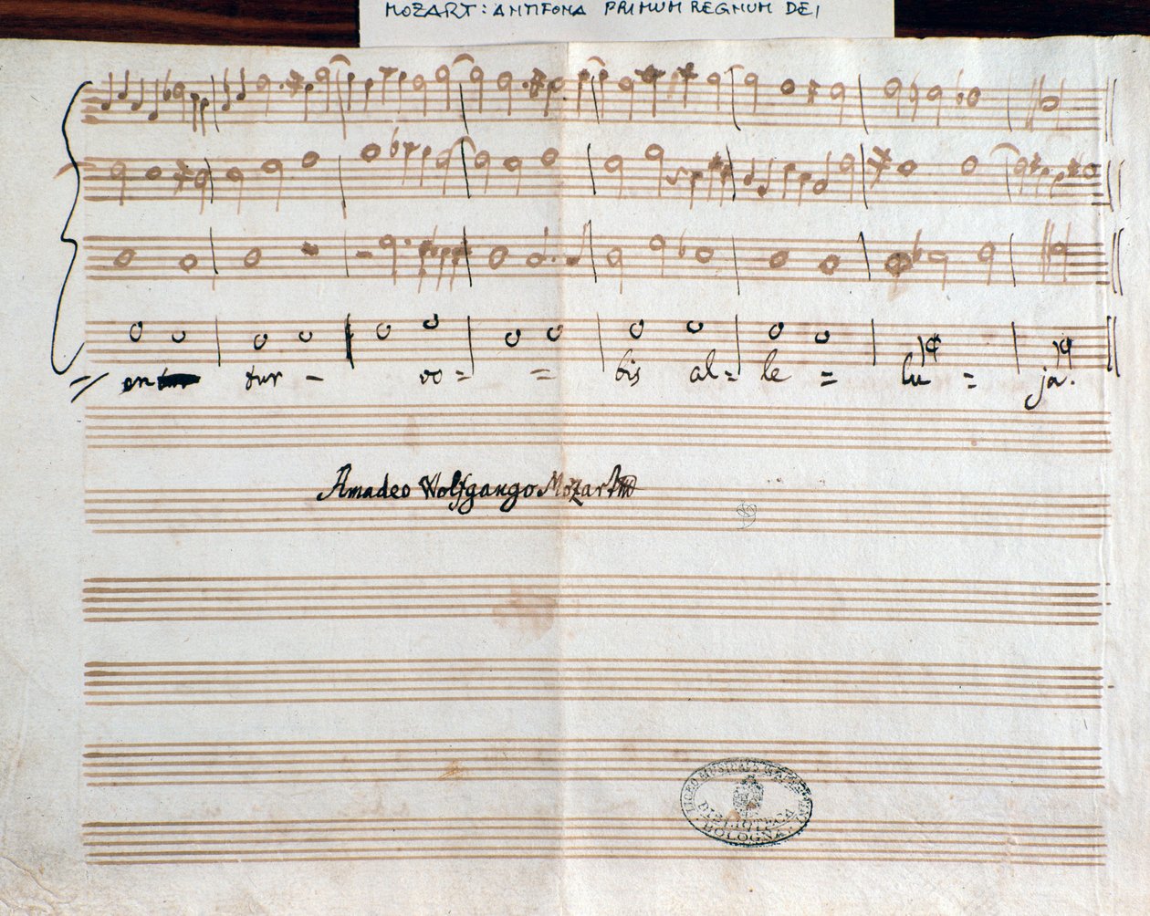 Side med komponistens signatur av Querite for første gang i Guds rike av Mozart for å oppnå tittelen Accademico filarmonico (1770) av Wolfgang Amadeus Mozart