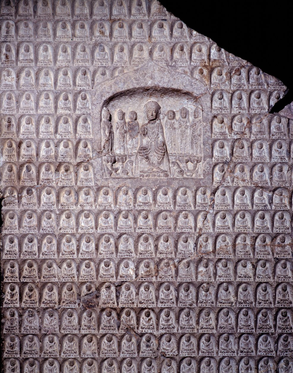 Kinesisk kunst: stele av de tusen Buddhaer. Periode av Zhou-dynastiet (Cheou). 11.-3. århundre f.Kr. Shanghai. Shanghai museum av Zhou Dynasty Chinese School