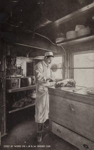 Kokk på jobb på L og NW Dining Car (s/hv-bilde) av (after) English photographer