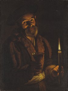 Gammel mann som holder et stearinlys og et glass
