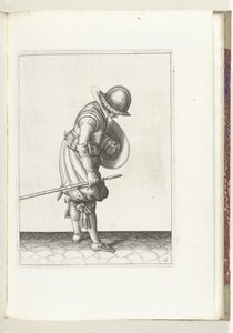 Skjold- og piggøvelsen: Soldaten setter piggen på bakken ved siden av sin høyre fot (nr. 16), 1618 Nassausche Wapen-Handelinge, van Schilt, Spies, Rappier and the Targe: beyde figuerlick avbildet, og innrammet etter den nye rekkefølgen [av] (...) M av Adam van Breen