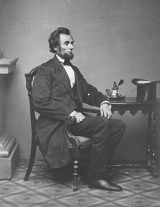 Abraham Lincoln, portrett i full lengde, sittende, 1861