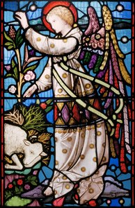En engel bringer en melding til Abraham om ikke å ofre sønnen sin, men erstatte en sau i stedet, som har blitt fanget i busker, ca. 1867 (farget glass)