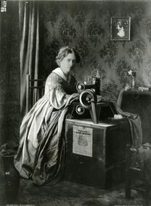 Annonse for Singers patentsymaskiner, 1899 av American Photographer