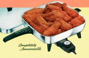 Kyllingsteking i en retro elektrisk panne av American School