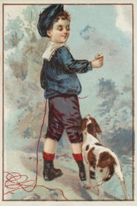 Ung gutt med hund av American School
