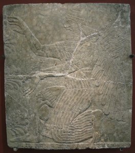 Bevinget guddom ved det hellige treet. Relieff fra palasset til Ashurnasirpal II i Kalhu, Nimrud, 900-tallet f.Kr. av Assyrian
