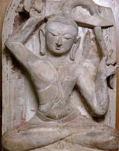 Sittende Buddha klipper håret