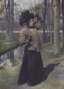 Kvinne i en park i Paris (fargebilde)