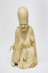 Utskåret elfenbensfigur av Shou Xing sittende med hjort, ca. 1580-1644 av Chinese School