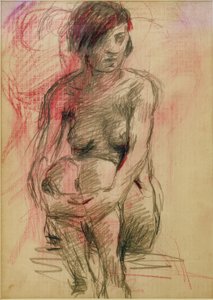 Sitter naken kvinne
