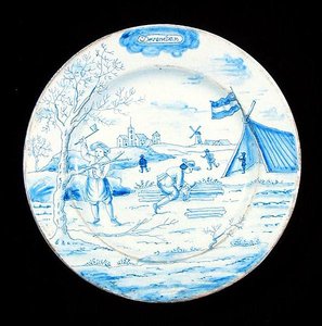 Delftvareplate som viser desember måned (tinnglasert lertøy) av Dutch School