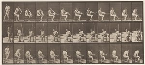 Tallerken 418. Toalett, sittende og strømper, 1872-1885 av Eadweard Muybridge