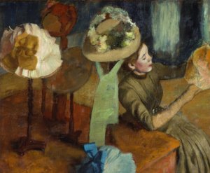 Hos hattemakeren av Edgar Degas