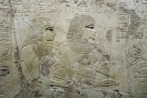 Egyptisk antikvitet: basrelieff som representerer gjestene på en begravelsesbankett - Graven til vizieren Ramose (18. dynasti) - Luxor, Theben, adelens grav Egypt - Egyptisk sivilisasjon: Basrelieff som viser gjestene ved en begravelsesbankett, fra graven  av Egyptian 18th Dynasty