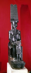 Sittende statue av guden Amon som beskytter Tutankhamon, New Kingdom, ca. 1336-1327 f.Kr. (granitt)