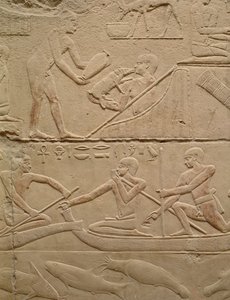 Relieff som viser en mann som passer på en nyfødt grisung og menn i papyrusbåter, fra Mastaba i Kagemni, Old Kingdom (malt kalkstein)