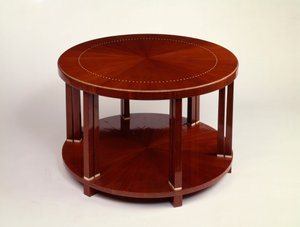 Et lavt rundt bord med to plan med palisanderfiner, innlagt med elfenben (palisander, elfenben) av Émile Jacques Ruhlmann