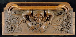 En misericord som viser et troll med enorme skuldre, New College Chapel, Oxford, sent på 1300-tallet (tre)