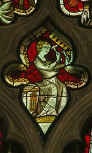 Et vindu i Lady Chapel som viser en musikerengel med bjeller av English School