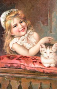 En ung jente poserer med en katt av English School