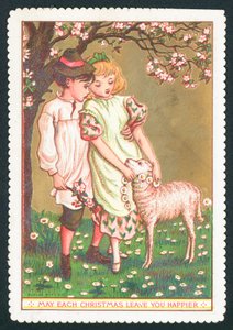 Mädchen und Junge mit Lamm