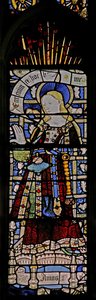 Østvinduet (Ew) som viser Jomfru Maria (sammensatt figur) - med juveler av innfelt glass av English School