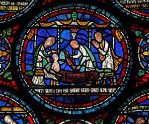 Window s6 som viser en scene fra et St Thomas Becket Miracle-vindu: Cicely of Plumstead(?) setter seg opp på båren hennes av English School