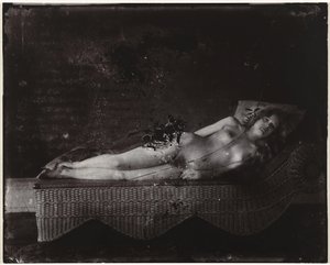 Naken kvinne på sjeselong Jente på flettet sjeselong, New Orleans (tittel på objekt) av Ernest James Bellocq