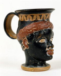 Etruskisk vase i form av et svart manns hode. Museo Nazionale de Tarquinia.