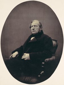 [Mann sitter i lenestol], 1850-60-tallet.