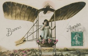 Nyttårs gratulasjonskort av en jente i et fly, 1913 (håndfarget bilde) av French Photographer
