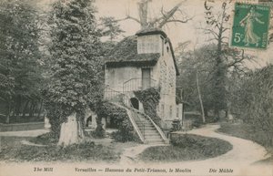 Bruket ved Hameau de la reine, et rustikk tilfluktssted bygget for Marie Antoinette i parken Chateau de Versailles nær Petit Trianon. Postkort sendt i 1913. av French Photographer